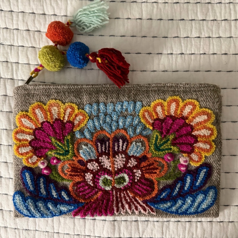 Noonday Collection Multicolor Embroidered Floral Clutch with Tassel Pom Poms
